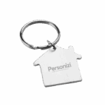 Chaveiro casa personalizado em metal — brinde simbólico e durável para construtoras, imobiliárias, eventos corporativos e campanhas promocionais.
